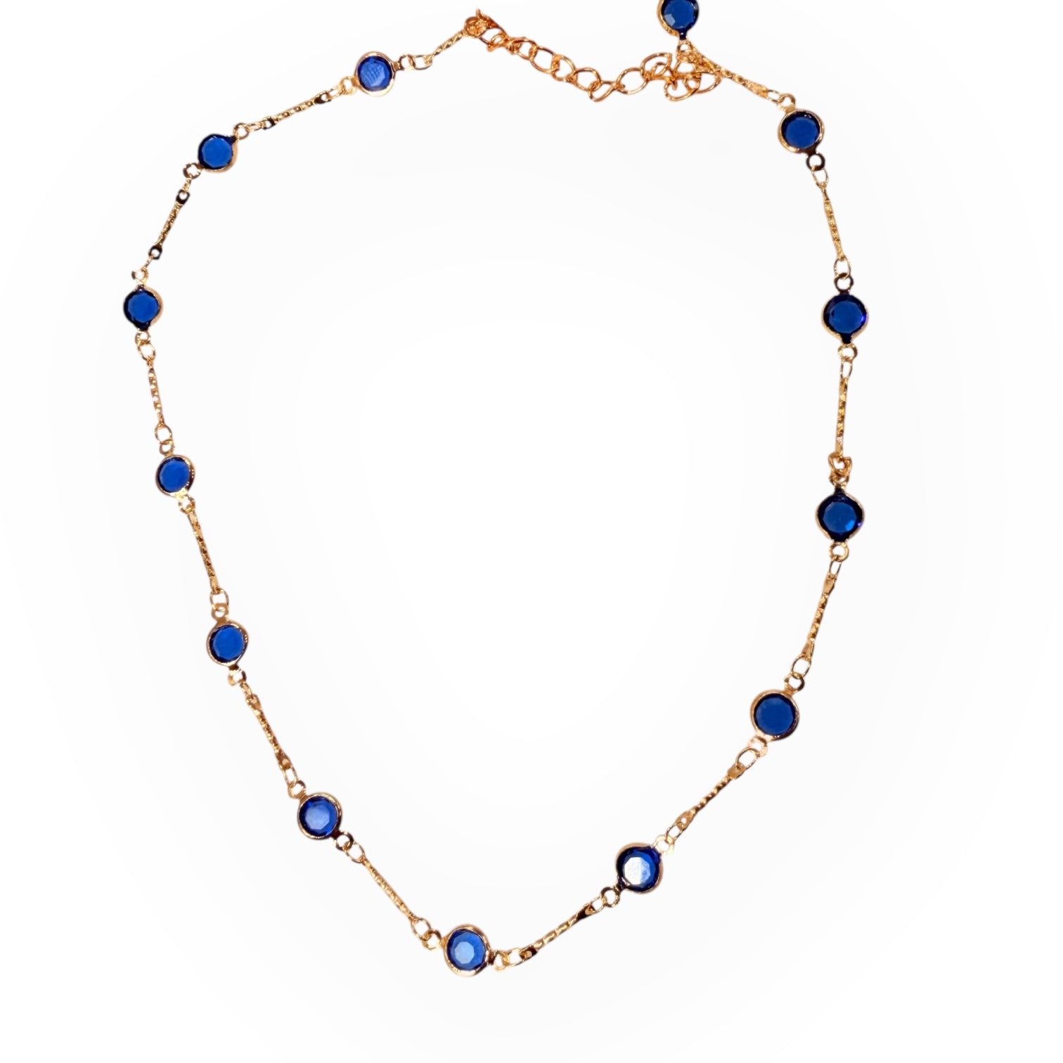 Gold necklace with blue gemstones 